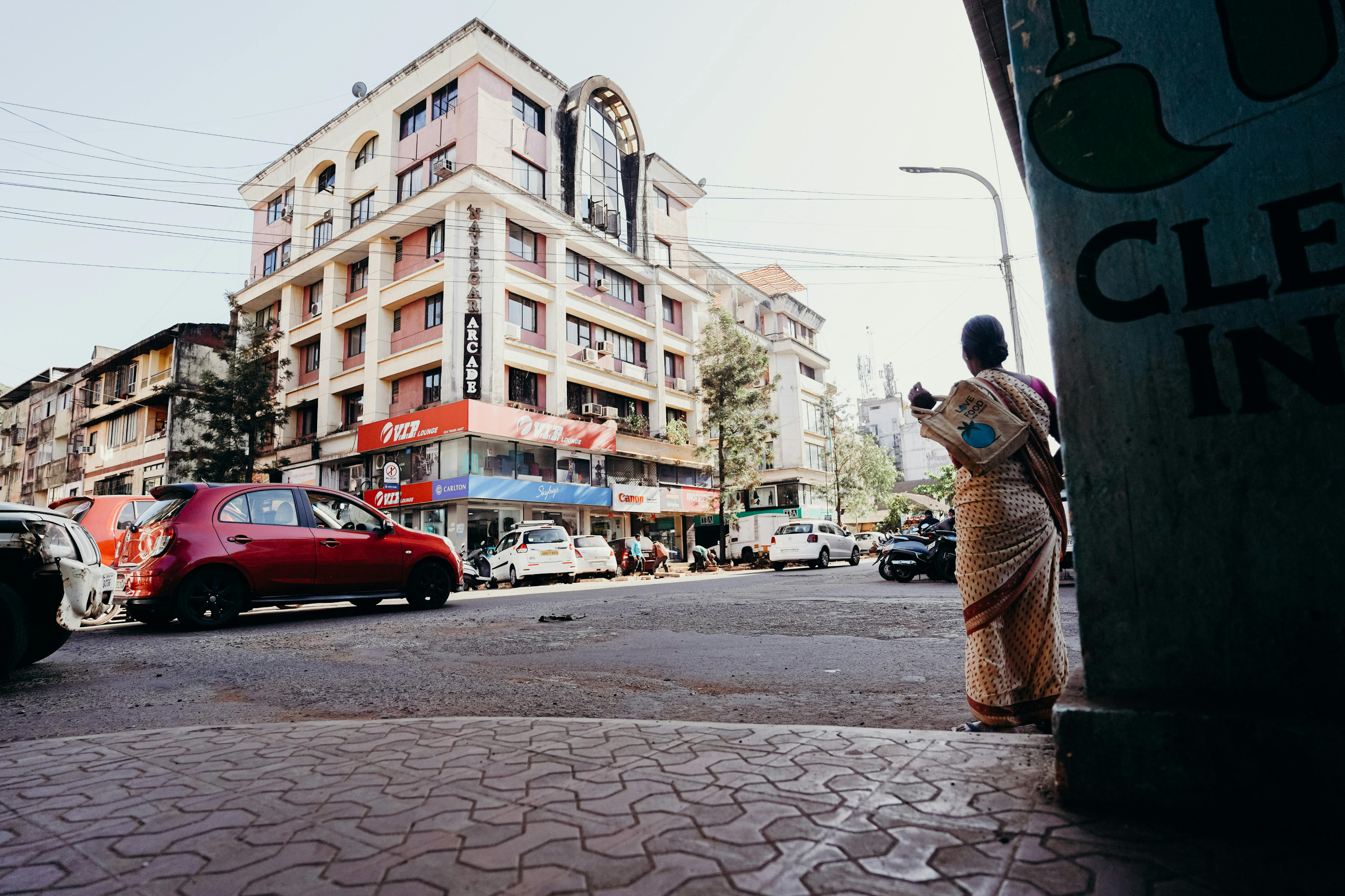 Venadu street commerce — woman in saree at road-side market